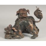 A GOOD CHINESE BRONZE FO DOG CENSER with two entwined dogs. 8ins high.