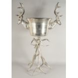 A LARGE STAG WINE COOLER on antler stand.