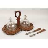 A RARE 19TH CENTURY BLACK FOREST CARVED WOOD SERVING TRAY with carrying handles, glass dishes and