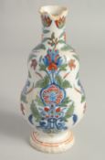 A ROOS ISLAMIC DESIGN POTTERY VASE 9ins.