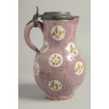 A GOOD LARGE 18TH CENTURY DUTCH FAIENCE JUG with pewter lid. 9ins high.
