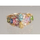 A 14CT MULTI STONE RING