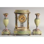 A GOOD 19TH CENTURY FRENCH ONYX AND CHAMPLEVE ENAMEL CLOCK GARNITURE, the clock with serpentine