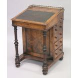 A GOOD VICTORIAN FIGURED WALNUT DAVENPORT by EDWARDS & ROBERTS with brass grill, tapering leather