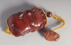 A JAPANESE CARVED WOOD OCTOPUS INRO. 4.5ins