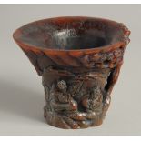 A GOOD CARVED HORN LIBATION CUP.