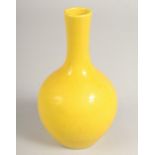 A SMALL CHINESE YELLOW VASE. Mark in blue. 7ins high