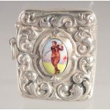 A VESTA with an oval in enamel of a golfer. 1.75ins x 1.5ins.