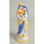 AN 18TH CENTURY FAIENCE POTTERY FIGURE, Madonna and child. 12ins high.