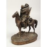 A SUPERB RUSSIAN BRONZE GROUP OF A MAN ON HORSEBACK KISSING A GIRL, cast by WOERFFEL, ST.
