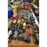 A large collection of 'O' gauge and 'OO' gauge Hornby and other trains, accessories including a