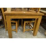 Modern oak rectangular dining table with six ladderback chairs (some seat covers worn).