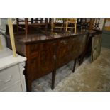 A mahogany sideboard.