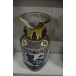 A large Chinese blue and white vase (rim missing a large piece).