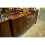 A mahogany sideboard.