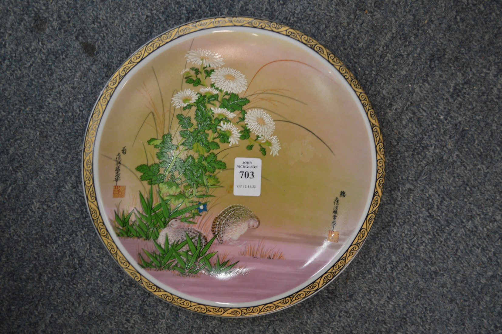 A Chinese dish painted with quails.