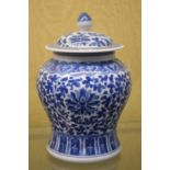 A Chinese blue and white jar and cover.