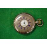 A gentlemen's silver half hunter pocket watch.