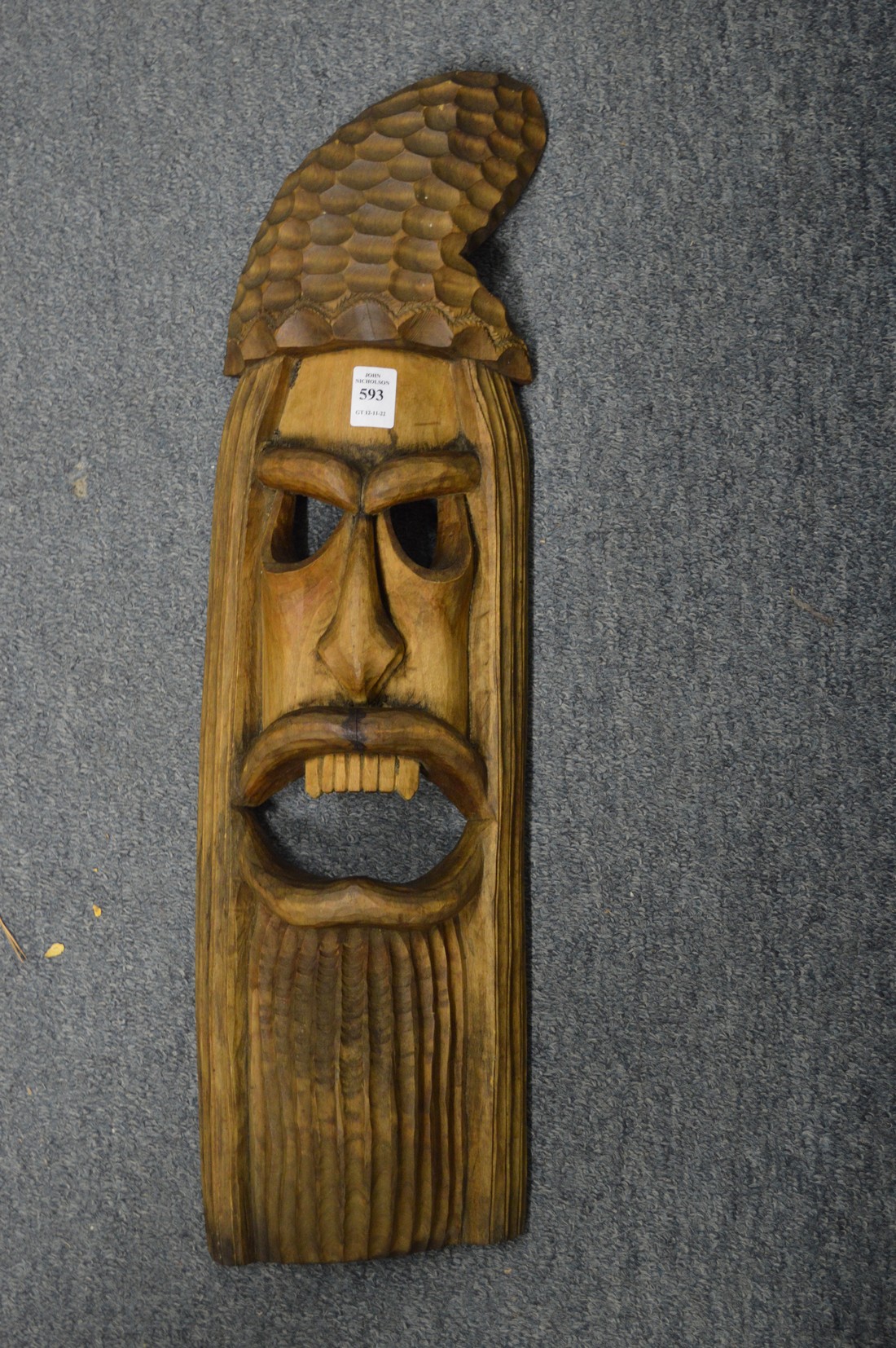 A carved wood mask.