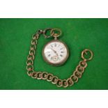 A pocket watch with gilt metal chain.