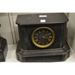 A slate mantel clock.