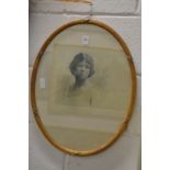 Photographic study of a young lady, oval.