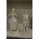 A pair of blanc de chine figures of a man and woman (af).