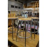 A set of four bar stools.