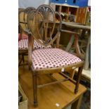 A set of eight Georgian style mahogany dining chairs, two with arms.