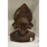 A carved hardwood bust.