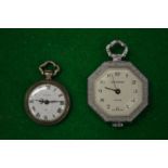 A miniature silver fob watch and another fob watch.