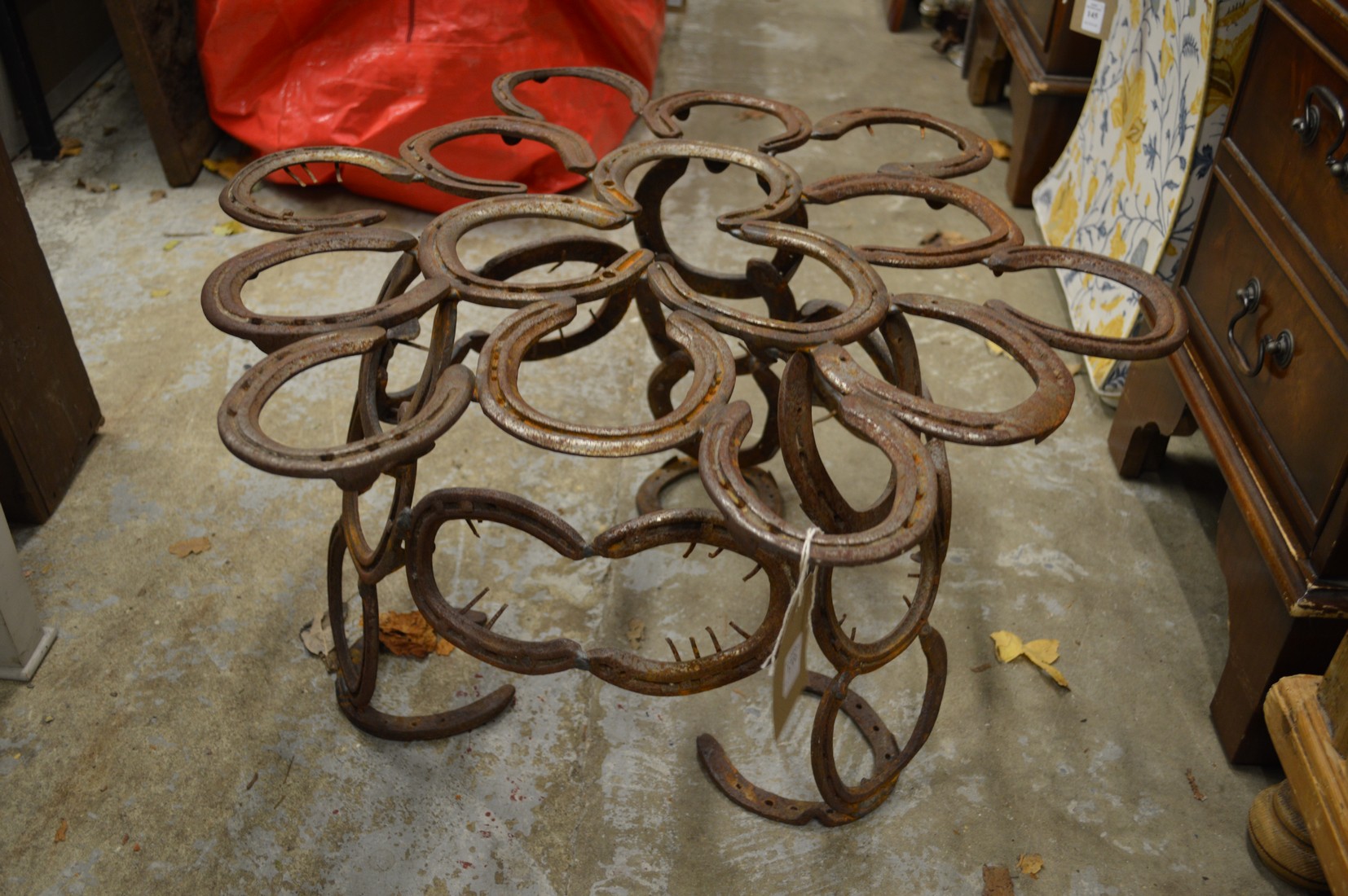 An unusual table base made from old horseshoes.