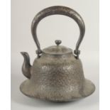 A LARGE 19TH CENTURY JAPANESE BRONZE TETSUBIN / KETTLE, with relief flower head decoration all over,