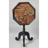 A CHINESE CARVED HARDWOOD TILT TOP TABLE, the octagonal table top inlaid with carved hardstone