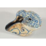 A 17TH CENTURY PERSIAN SAFAVID GLAZED POTTERY OIL LAMP, 10cm.