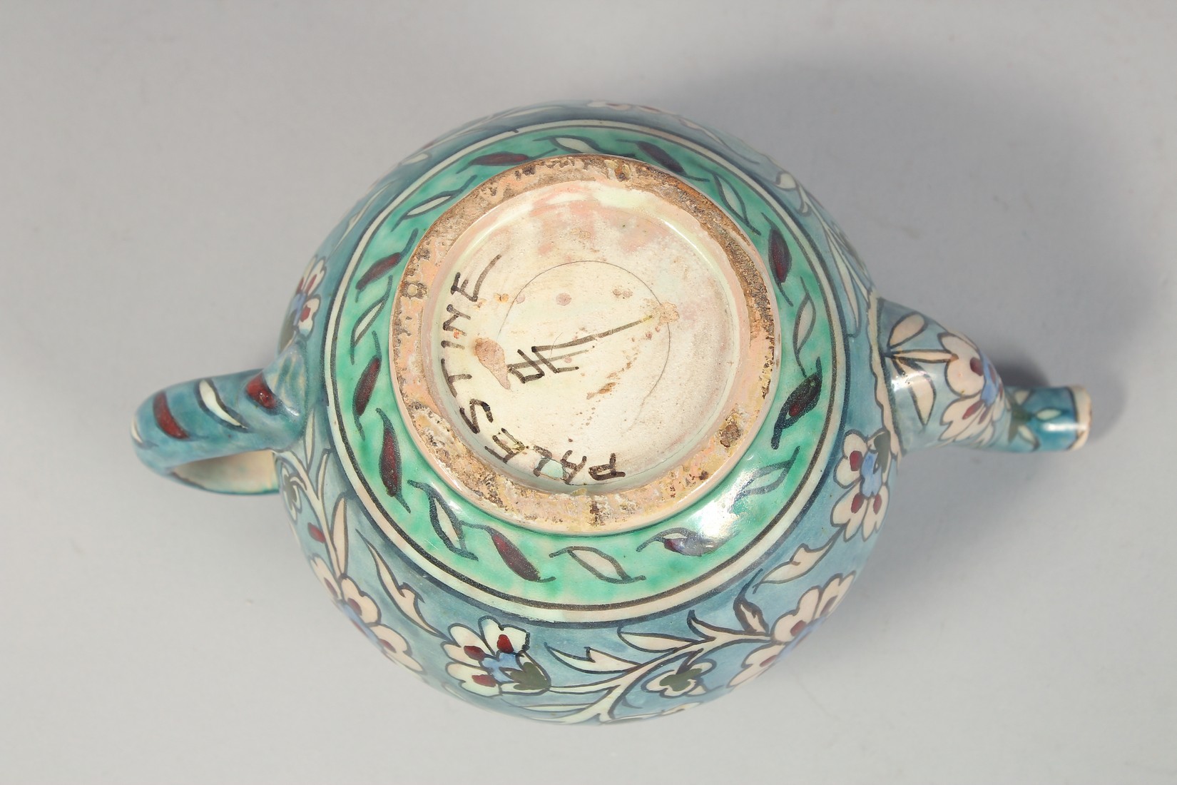 A PALESTINIAN TURQUOISE GLAZE POTTERY PART TEA SET, each piece painted with floral decoration, - Image 9 of 10