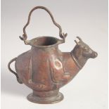 AN UNUSUAL 19TH CENTURY SOUTH INDIAN COPPER NANDI BULL SHAPED EWER. 13cm long