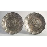 A PAIR OF JAPANESE EMBOSSED PETAL FORM WHITE METAL DISHES, each with central panel depicting