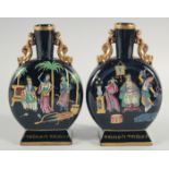 A PAIR OF ORIENTAL ENAMELLED VASES, with gilded handles and painted with figures, 22cm high.