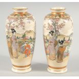 A PAIR OF JAPANESE SATSUMA VASES, in original wooden box, each painted with female figures in