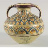 A FINE LARGE 19TH CENTURY NORTH AFRICAN TUNISIAN GLAZED POTTERY VASE, with twin handles, signed,