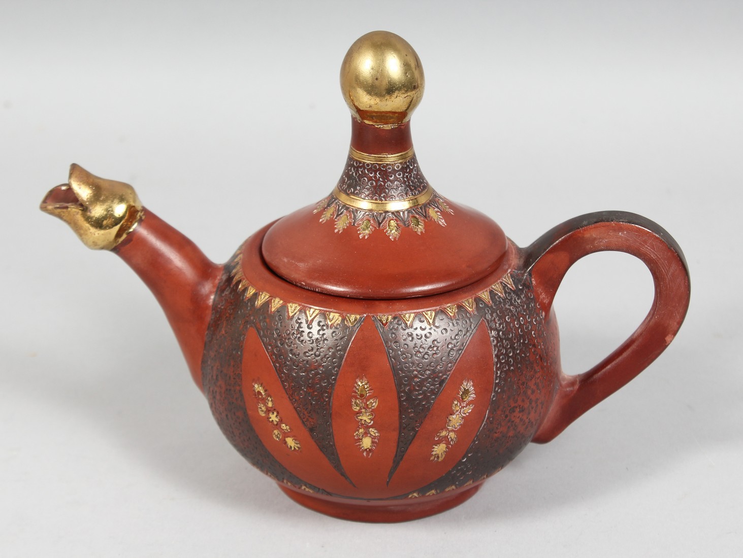 A GOOD TURKISH TOPHANE POTTERY TEAPOT, (repair to lid), 21cm wide (spout to handle).