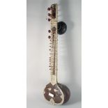 AN INDIAN BONE OVERLAID SITAR, 122cm long.