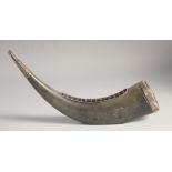 A METAL-MOUNTED BOVINE HORN, the mounts with engraved and chased foliate decoration, 37cm long.