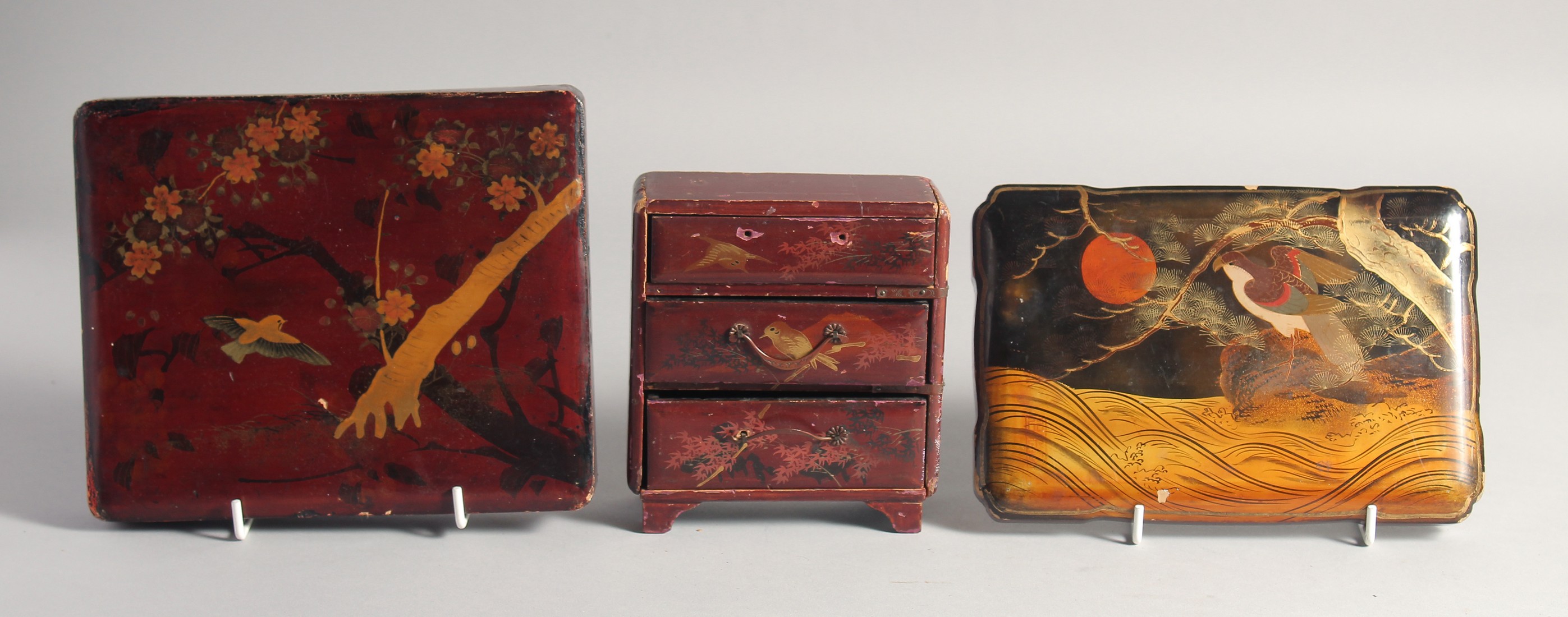 A LACQUERED WOOD BOX, 19.5cm x 16cm, together with a similarly designed lacquered miniature chest of