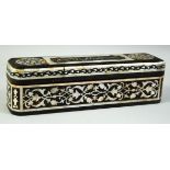 A TORTOISESHELL AND MOTHER OF PEARL INLAID PEN BOX, the lid with inlaid mother of pearl calligraphy,