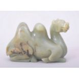 A CARVED JADE MODEL OF A CAMEL, 9cm long.