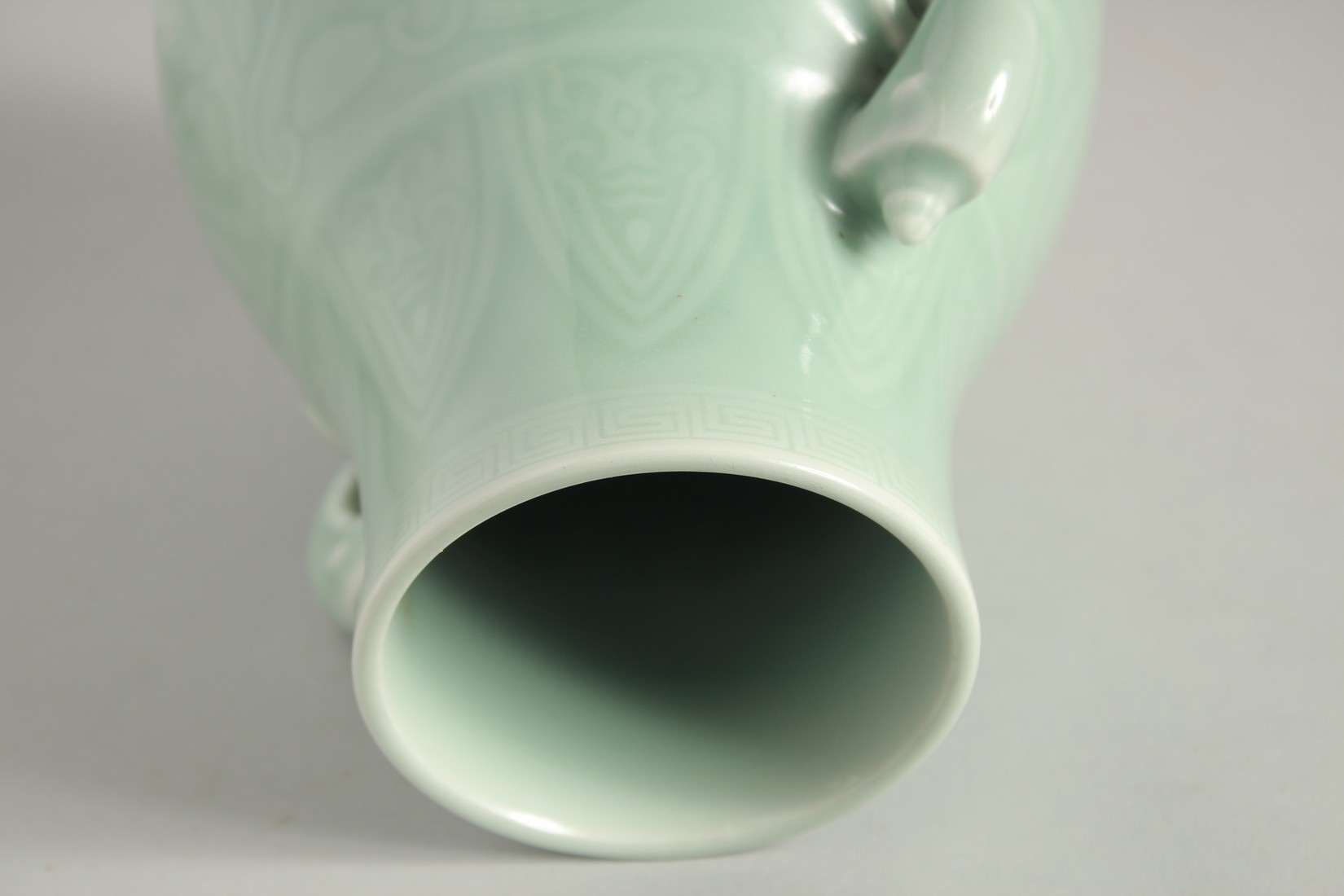 A CHINESE CLAIRE-DE-LUNE CELADON GLAZE TWIN HANDLE VASE, of archaic form with moulded handles and - Image 5 of 8