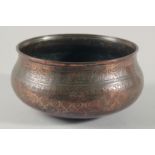 A FINE LARGE 17TH CENTURY PERSIAN SAFAVID COPPER BOWL, engraved with a band of calligraphy and