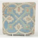 A PERSIAN SAFAVID CUERDA SECA POTTERY TILE, 20cm square.